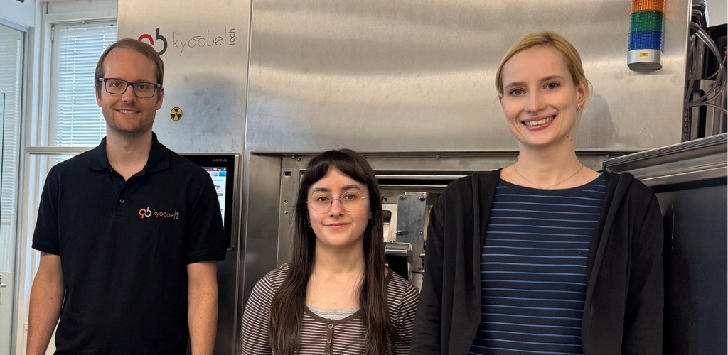 Cover image for the article: Successful Factory Acceptance Test (FAT) of eFIT, showing three KyooBe employees participating in the FAT.